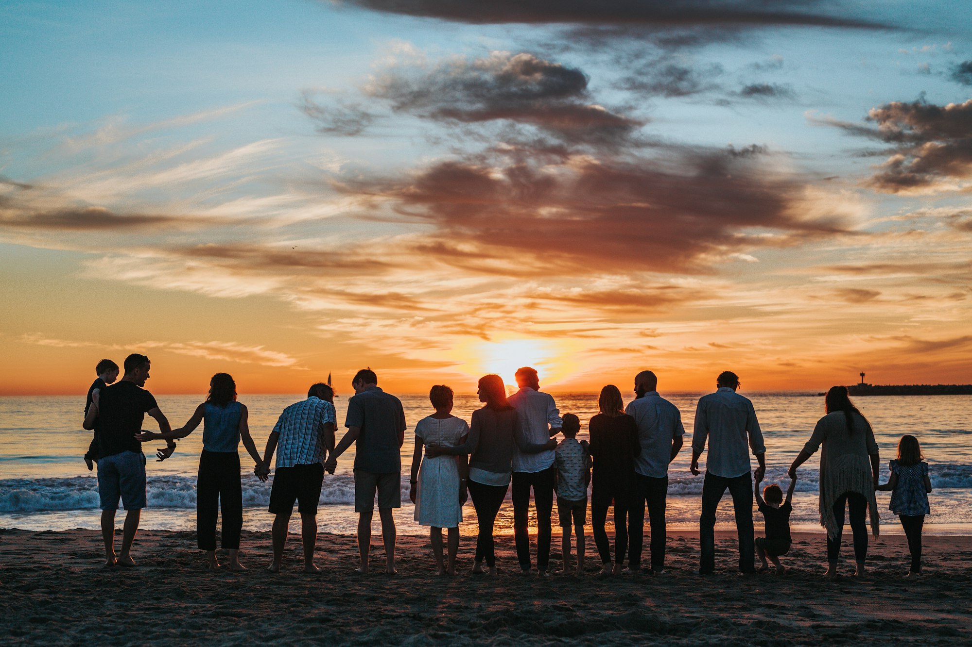 Family hands together, representing family and succession law